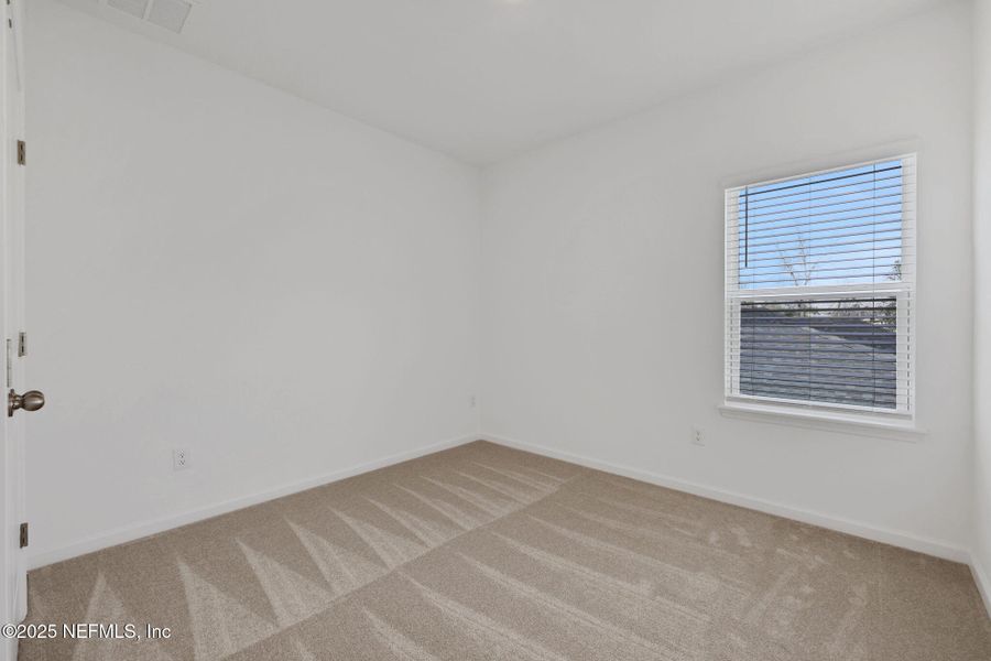 Spacious, unfurnished interior of a new home in TrailMark, St. Augustine (Image 31).