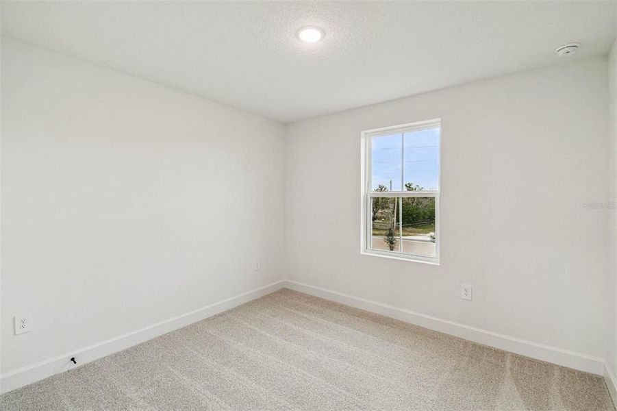 Spacious, unfurnished interior of a new home in Aspire at Canter Creek, Davenport (Image 22).