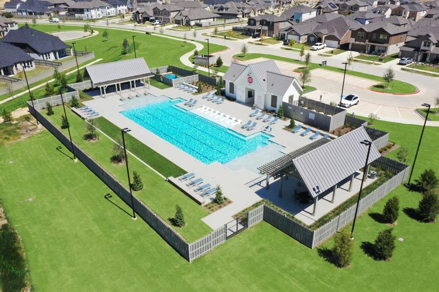 Community pool featuring a patio, a pergola, and a residential view