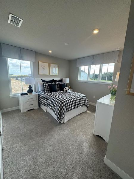 Furnished interior view inside a new home in Lake Mattie Preserve Estates, Auburndale (Image 10). Furnished interior view inside a new home in Lake Mattie Preserve Estates, Auburndale (Image 10).
