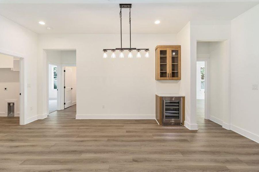 Dining area with wine cooler and Wine Rack
