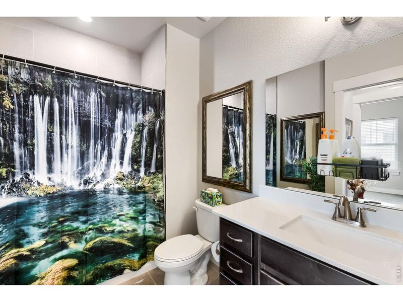 Furnished interior view inside a new home in Highlands at Fox Hill - The Flats, Longmont (Image 27).