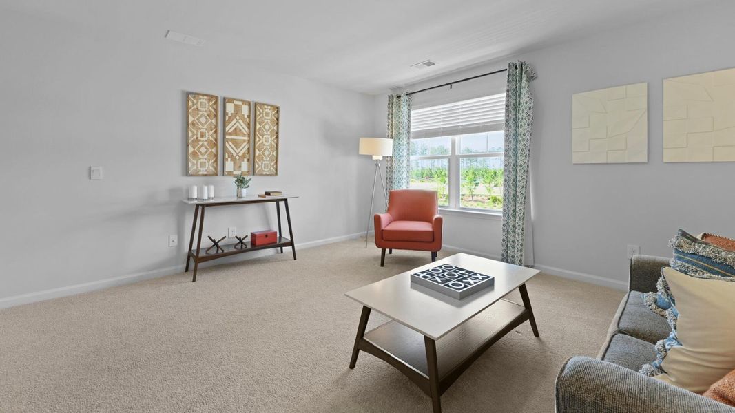 Furnished interior view inside a new home in Pine Hills at Cane Bay, Summerville (Image 29).