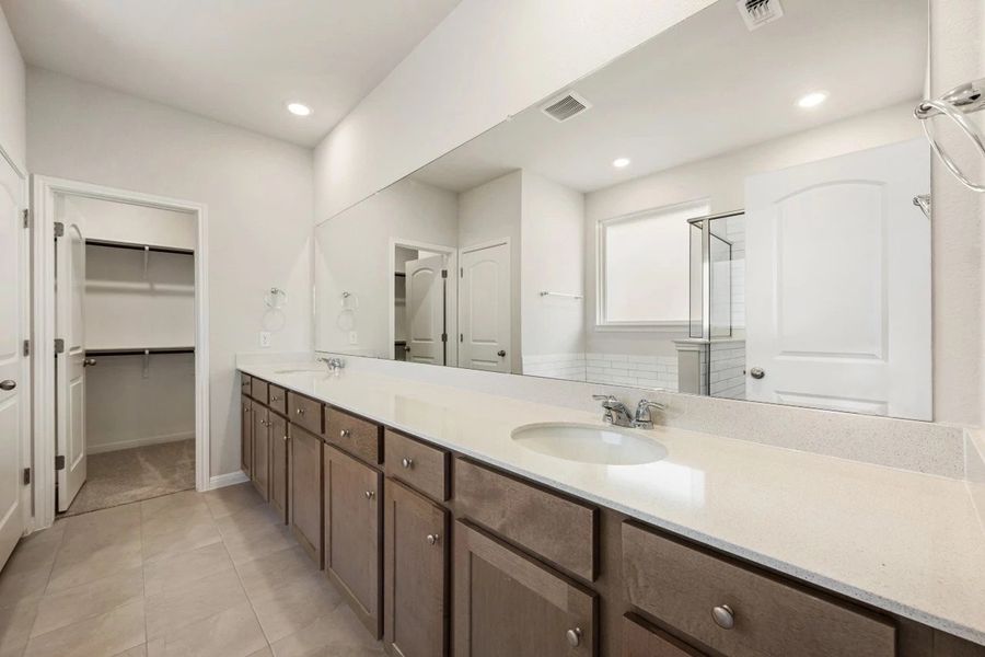 Furnished interior view inside a new home in The Colony, Bastrop (Image 14).