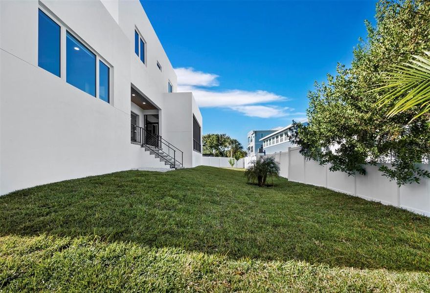 Exterior details and patio area of a home in , Longboat Key (Image 26).