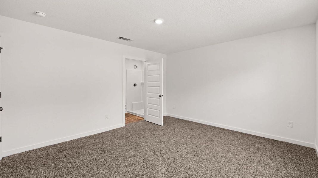 Spacious, unfurnished interior of a new home in Magnolia at the Bluffs Phase 3, Freeport (Image 18).