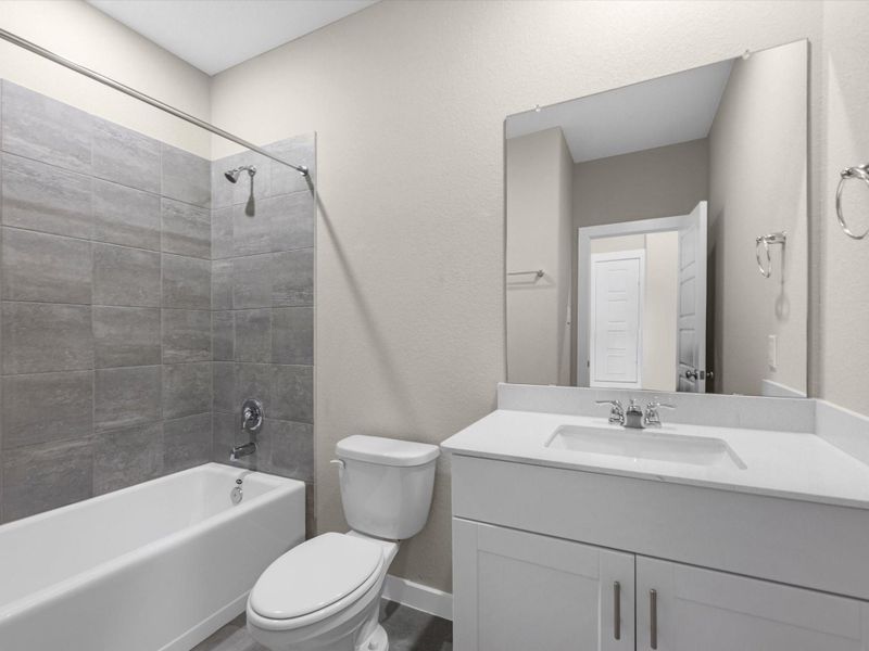 Furnished interior view inside a new home in Montgomery Oaks - Premier, Conroe (Image 4). Furnished interior view inside a new home in Montgomery Oaks - Premier, Conroe (Image 4).