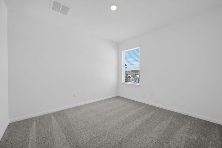 Spacious, unfurnished interior of a new home in Travisso Capri Collection, Leander (Image 15).