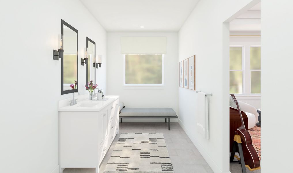 Primary bath with dual sinks and chrome fixtures Primary bath with dual sinks and chrome fixtures