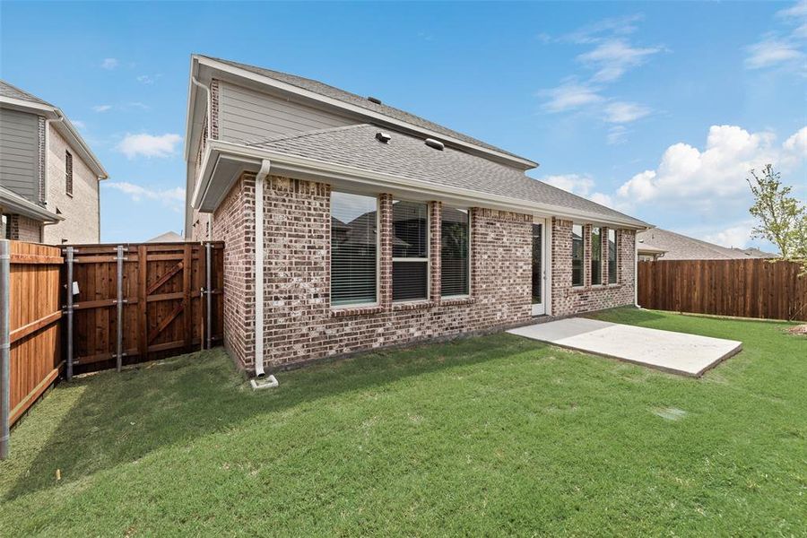 Front exterior of a new home in Villages of Hurricane Creek, Anna, TX, highlighting curb appeal (Image 21). Front exterior of a new home in Villages of Hurricane Creek, Anna, TX, highlighting curb appeal (Image 21).