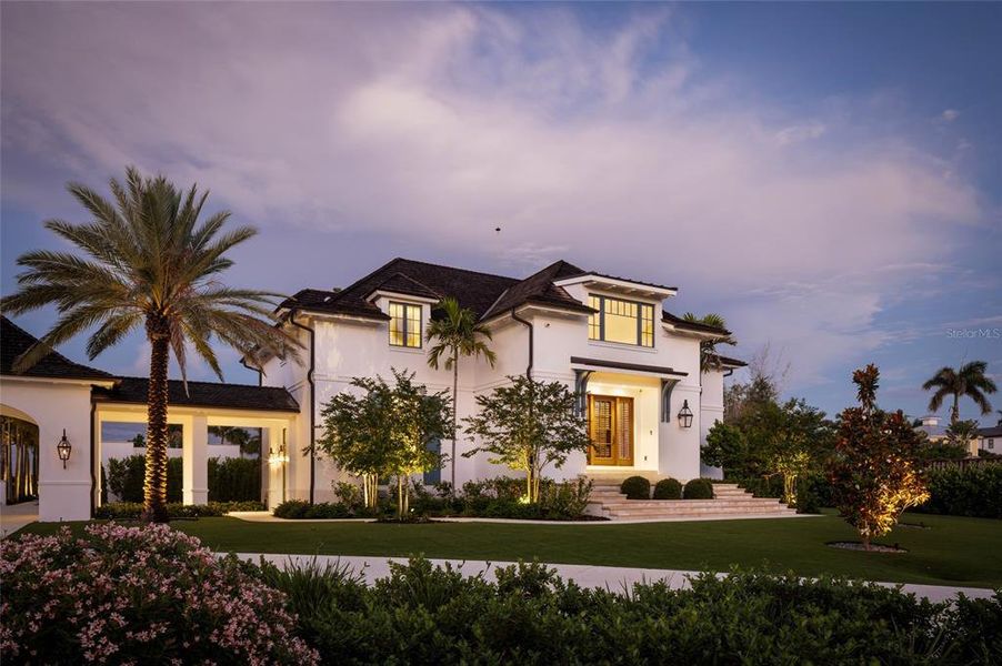 Front exterior of a new home in , Sarasota, FL, highlighting curb appeal (Image 26). Front exterior of a new home in , Sarasota, FL, highlighting curb appeal (Image 26).