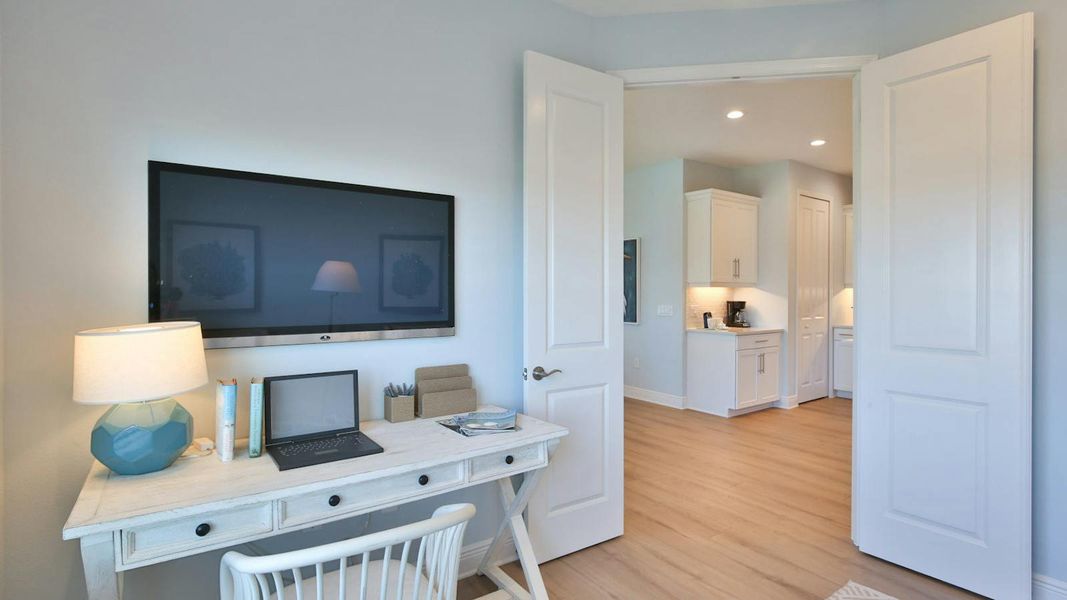 Furnished interior view inside a new home in Palm Grove Real Estate and Homes for Sale in Lakewood Ranch, FL - Neal Communities, Lakewood Ranch (Image 29).