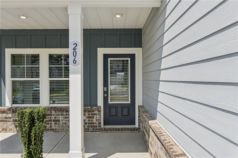 Exterior details and patio area of a home in The Hills at Cedar Creek, Winder (Image 22). Exterior details and patio area of a home in The Hills at Cedar Creek, Winder (Image 22).
