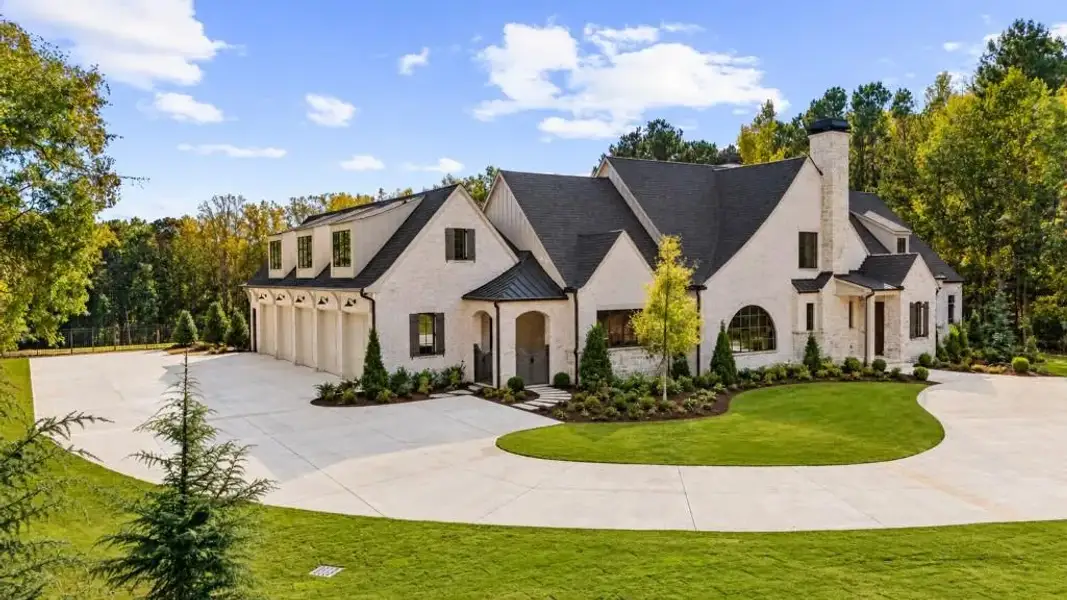 Front exterior of a new home in , Milton, GA, highlighting curb appeal (Image 26).