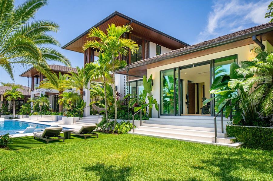 Exterior details and patio area of a home in , Coral Gables (Image 18).
