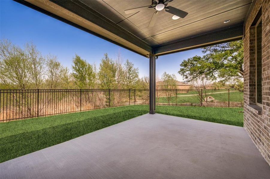Exterior details and patio area of a home in , Little Elm (Image 26). Exterior details and patio area of a home in , Little Elm (Image 26).