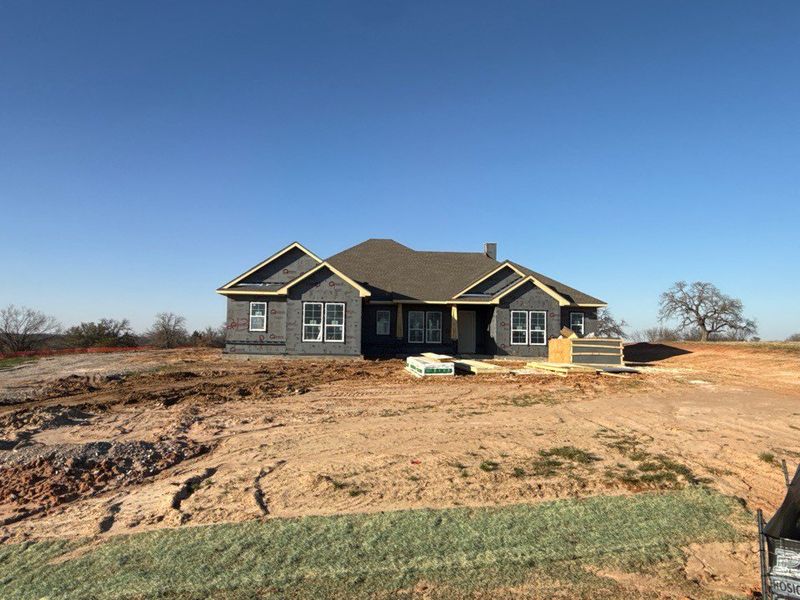 In-progress construction of a new home in Oak Grove Addition, Springtown, TX (Image 4).