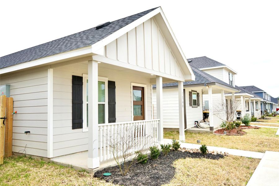 Exterior details and patio area of a home in , Conroe (Image 3).