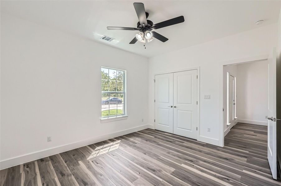 Bedroom 4 with a closet, and ceiling fan,