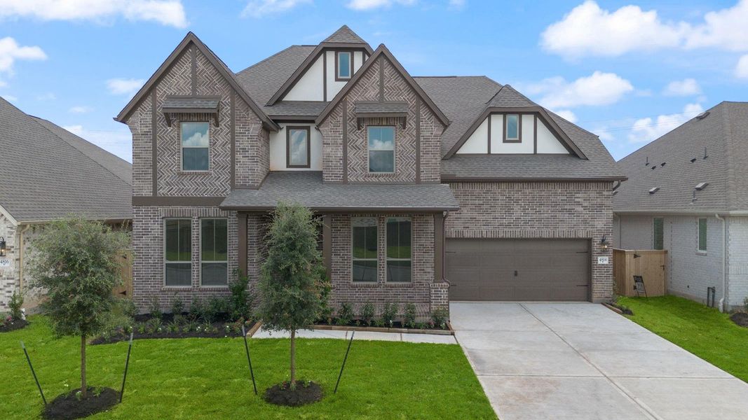 Front exterior of a new home in Coastal Point, League City, TX, highlighting curb appeal (Image 21).