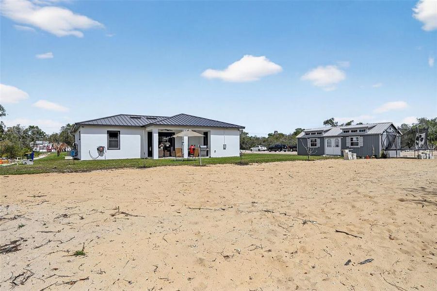 Exterior details and patio area of a home in , Lake Placid (Image 25).
