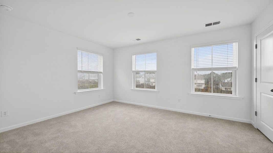Spacious, unfurnished interior of a new home in Clear Springs Townhomes, North Charleston (Image 25).