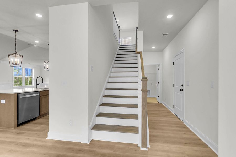 Spacious, unfurnished interior of a new home in Tidewater at Lakes of Cane Bay, Summerville (Image 27).