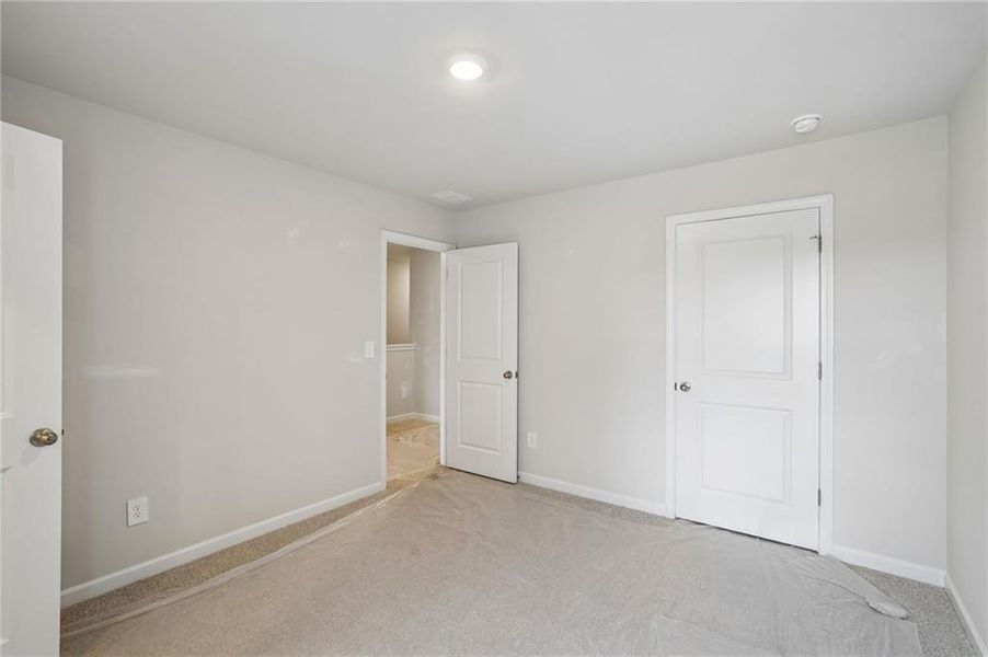 Spacious, unfurnished interior of a new home in Artisan Walk, Fairburn (Image 25).