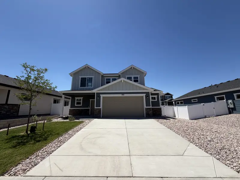 Front exterior of a new home in Union Colony West, Greeley, CO, highlighting curb appeal (Image 2). Front exterior of a new home in Union Colony West, Greeley, CO, highlighting curb appeal (Image 2).