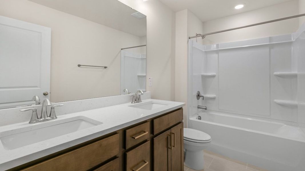 Representative furnished interior of a home built from the Hartwell by D.R. Horton in Kalas Falls, Wake Forest (Image 9).