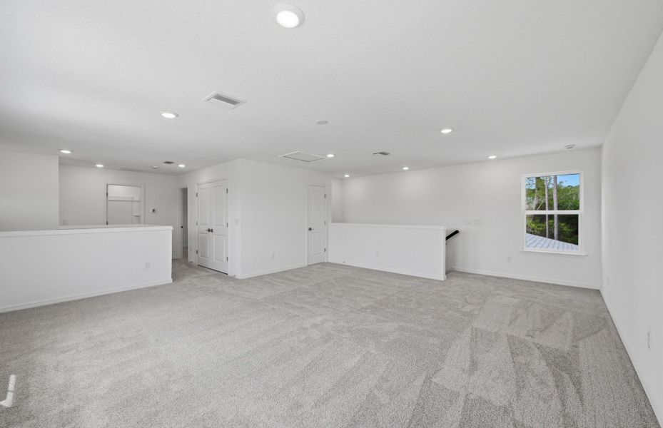 Spacious, unfurnished interior of a new home in Fiddler's Cove, Kingsland (Image 24).