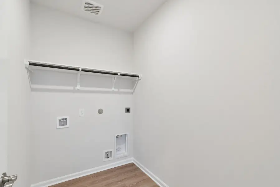 The Oakshire II- Utility Room.  Sample image for illustration; upgrades, options, and colors may vary.