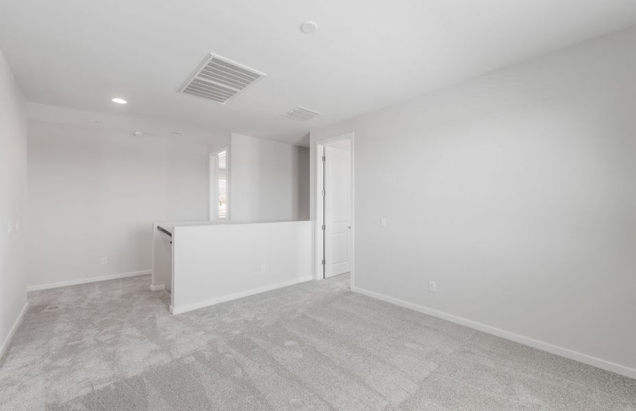 Spacious, unfurnished interior of a new home in Soleo, San Tan Valley (Image 13).