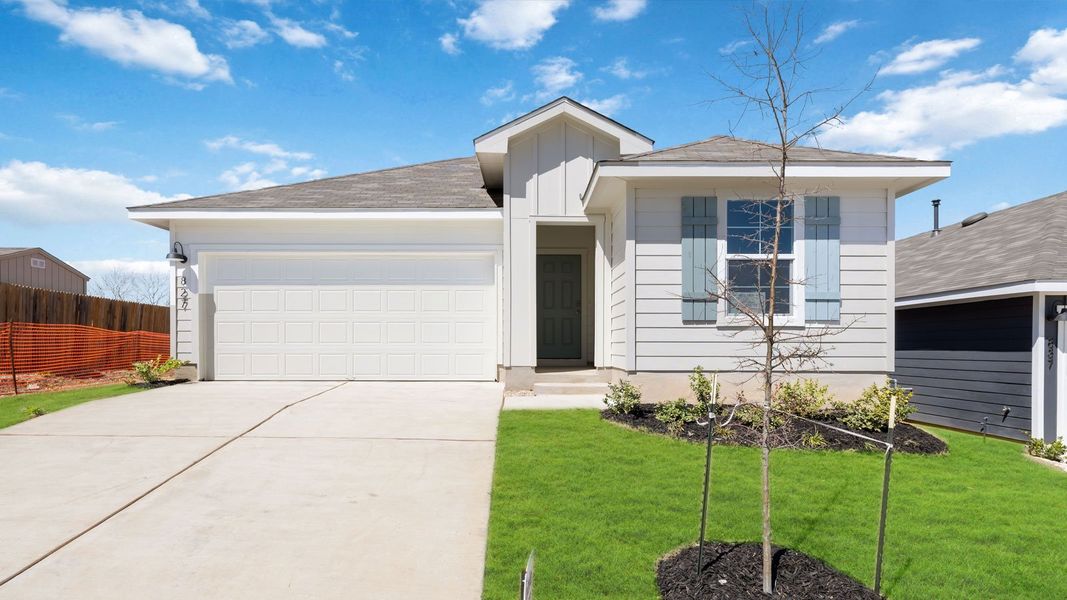 Front exterior of a new home in Wayside, Uhland, TX, highlighting curb appeal (Image 24).