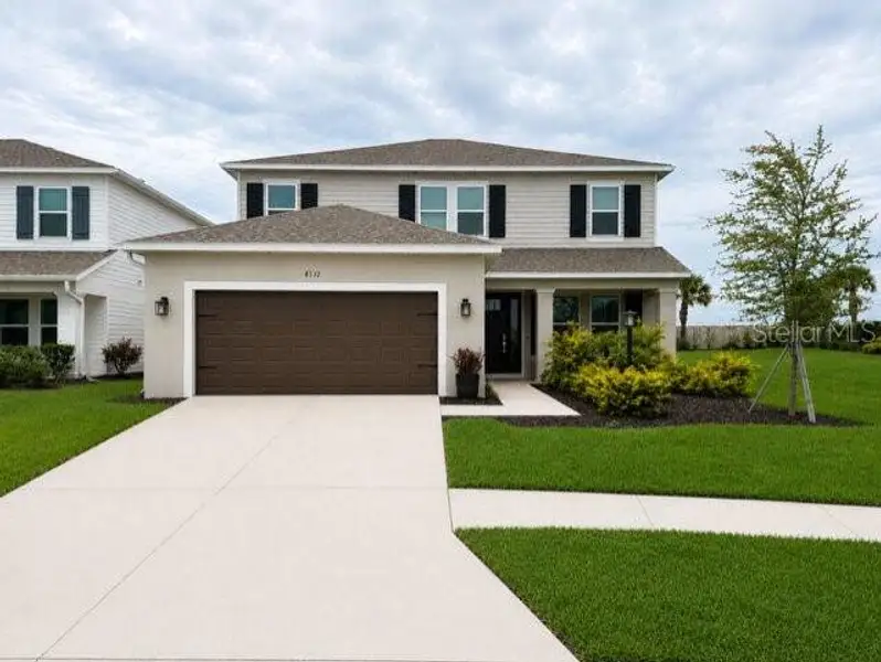Front exterior of a new home in , Sarasota, FL, highlighting curb appeal (Image 1). Front exterior of a new home in , Sarasota, FL, highlighting curb appeal (Image 1).