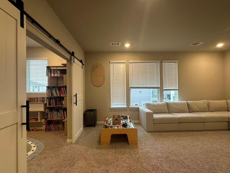 Sitting Area and Barn Door leads to Big Game Room