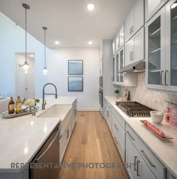 Furnished interior view inside a new home in Bridgeland, Cypress (Image 4).