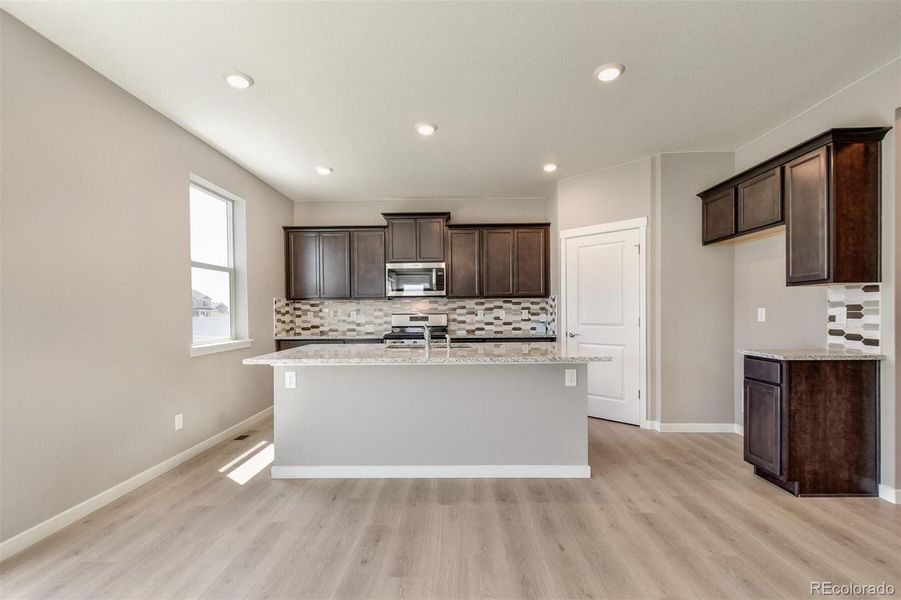 Furnished interior view inside a new home in Timberleaf, Thornton (Image 9).
