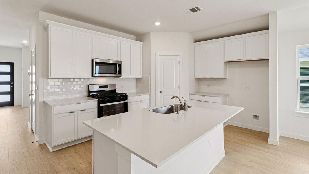 Furnished interior view inside a new home in Monarch Ranch, Manor (Image 6).