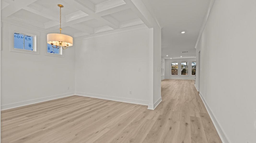 First-rate hardwood flooring greets you in a welcoming and elegant foyer