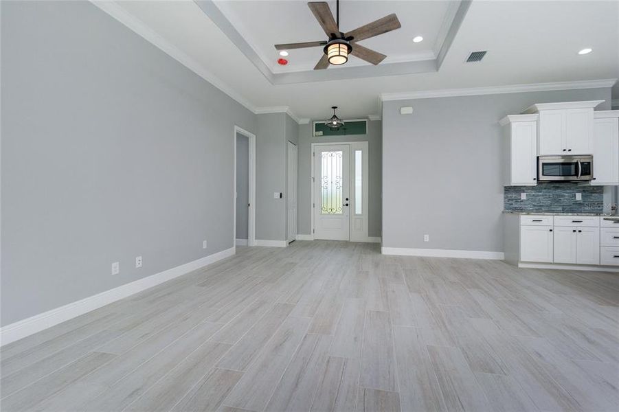 Spacious, unfurnished interior of a new home in , Port Charlotte (Image 31).