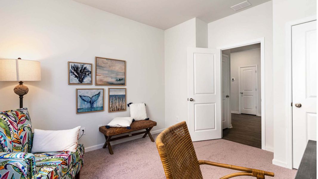 Representative furnished interior of a home built from the CALI by D.R. Horton in Eden Springs, Longs (Image 12).