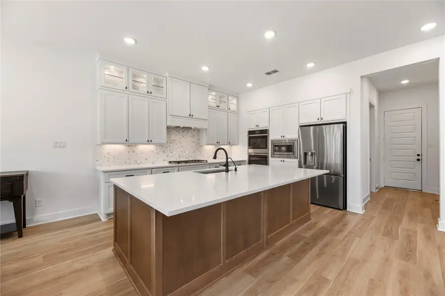 Furnished interior view inside a new home in Bridgeland, Cypress (Image 9).