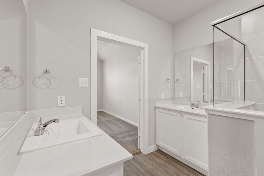 Primary bathroom in the Elm home plan by Trophy Signature Homes – REPRESENTATIVE PHOTO