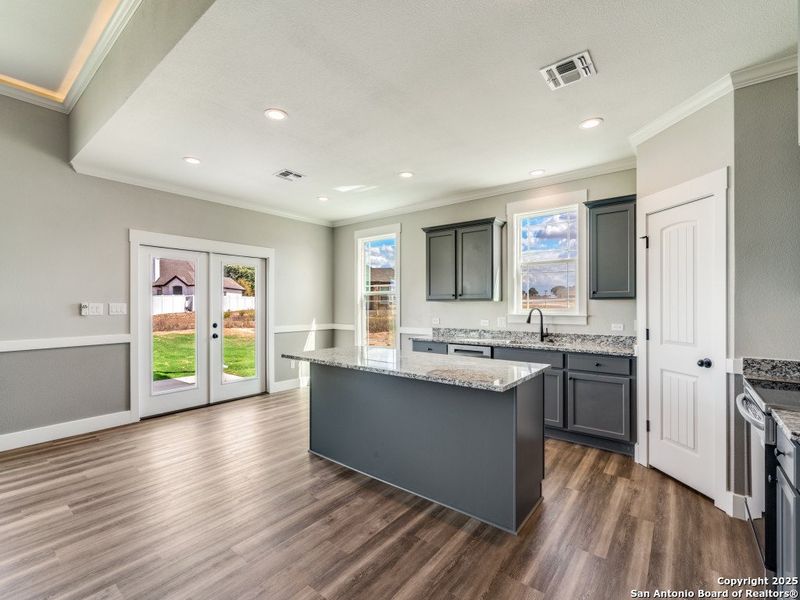 Furnished interior in a model home at Las Palomas Country Club Estates in La Vernia (Image 7). Furnished interior in a model home at Las Palomas Country Club Estates in La Vernia (Image 7).