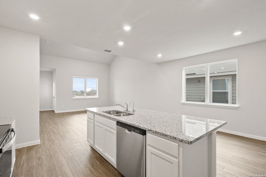 Furnished interior view inside a new home in Abbott Place, St. Hedwig (Image 9).