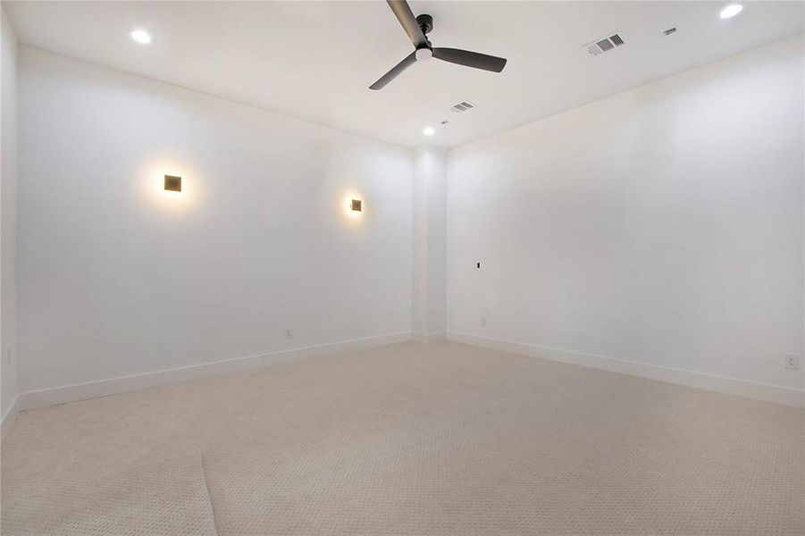 Spare room featuring ceiling fan, light colored carpet, recessed lighting, and baseboards Spare room featuring ceiling fan, light colored carpet, recessed lighting, and baseboards