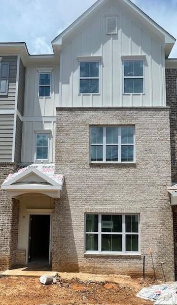 In-progress construction of a new home in Townes at South Main, Kennesaw, GA (Image 24).