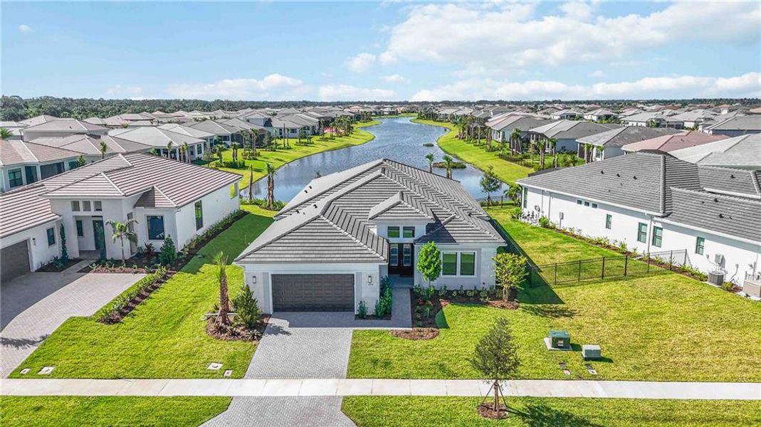 Front exterior of a new home in , Sarasota, FL, highlighting curb appeal (Image 1). Front exterior of a new home in , Sarasota, FL, highlighting curb appeal (Image 1).