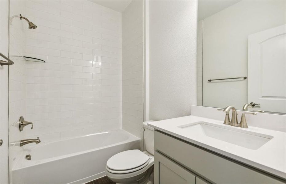 Spacious secondary bathroom with premium finishes *real home pictured